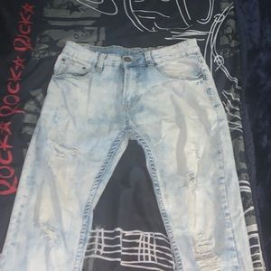 Light blue ripped jeans